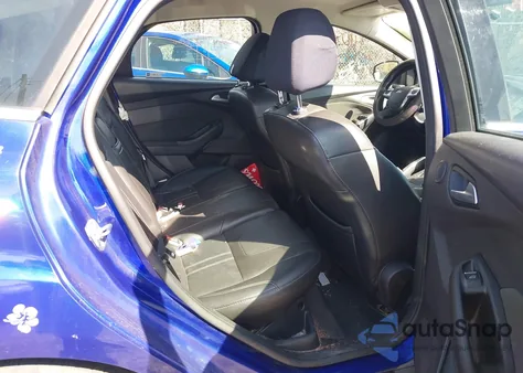 2013 Ford Focus Titanium z USA, uszkodzony, nr VIN 1FADP3N22DL128971